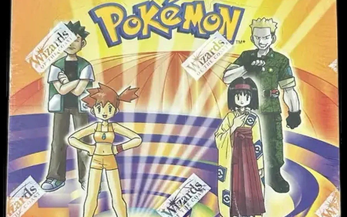 Versiegeltes Gym-Heroes-Display der ersten Edition auf einer Holzplatte